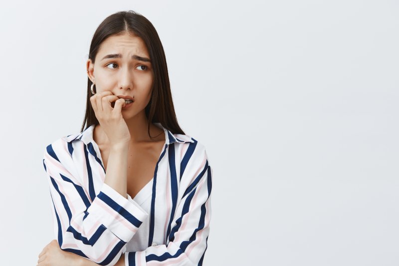 young woman experiencing dental anxiety