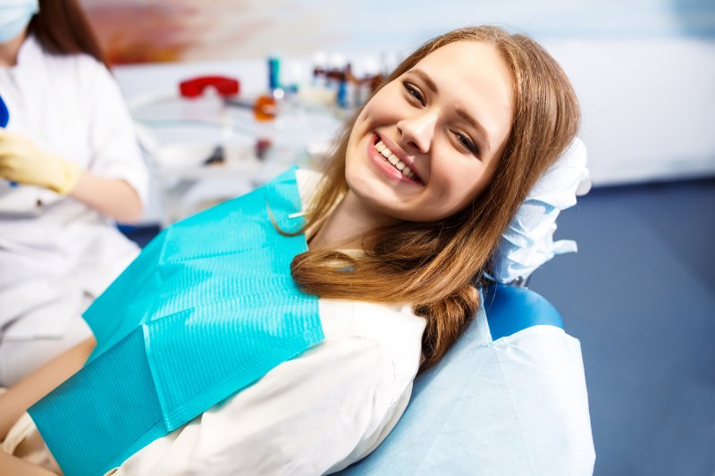 woman smiling before root canal therapy in Altavista